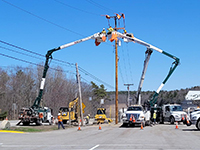 Temporary utility relocation work, work being done within Taste of Maine parking lot.